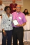 Bishop Reid receives a token for his work with Cursillo
