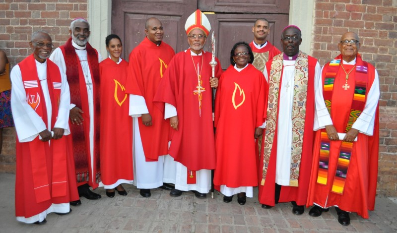 The newly-ordained Priest (at back) and Deacons (centre) with Bishops of the Diocese
