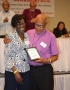 Bishop Reid receives a token for his work with Cursillo