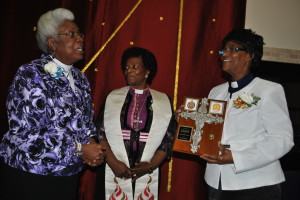 Bishop Wamukoya (centre) in the WOM stole with Rev. Jean Fairweather-Wilson (left) and the Rev. Canon Judith Daniel