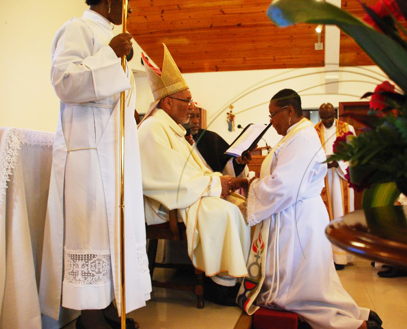 Bishop Gregory Admits Rev Mary.Grand Cayman 2014