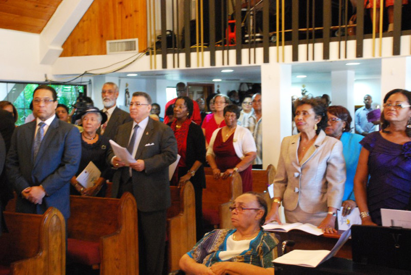 Cayman Islands Premier, The Hon. Alden McLaughlin (front row - left); Opposition Leader, the Hon. McKeeva Bush (third left); and Mrs. Charmaine Gregory (second right) in the congregation